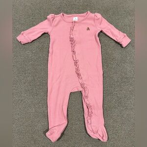 Gap baby pink ribbed ruffle footed one-piece.